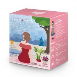 A pink box with a woman in a red dress sitting in front of a tree.